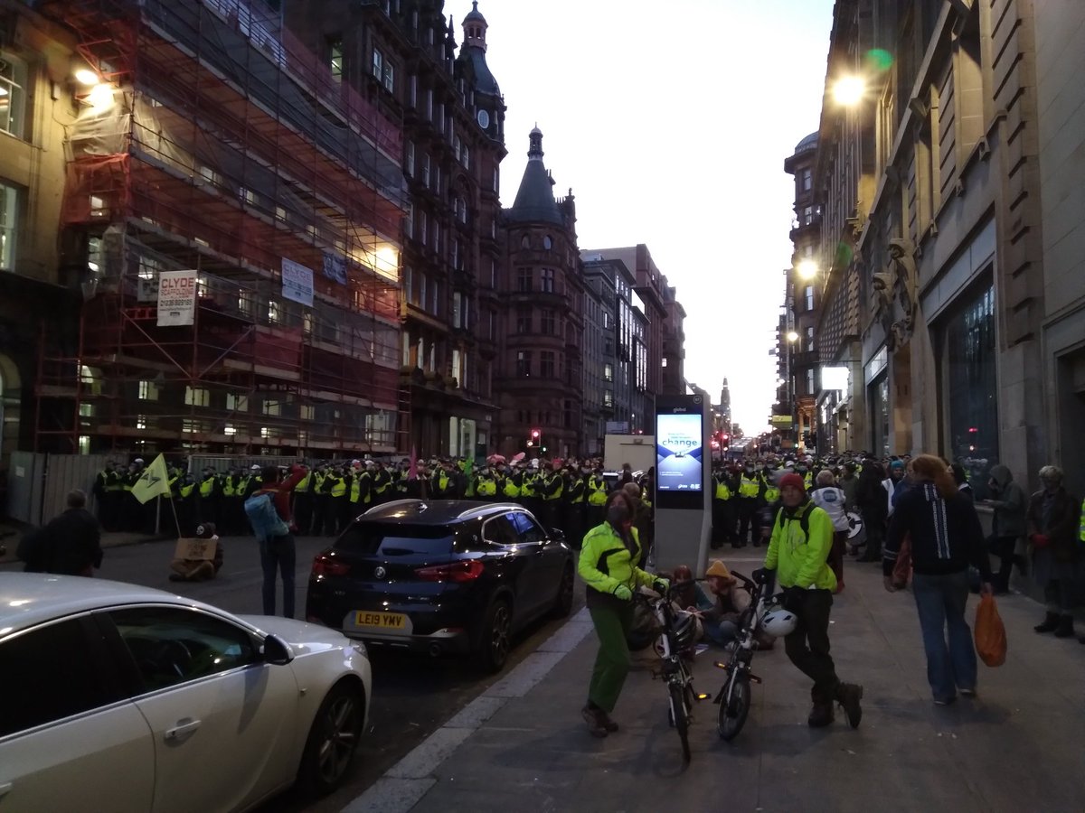 robintransition's tweet photo. So Rob, how did you spend your third day in Glasgow for COP26. Well, thanks for asking... a good chunk of it was spent kettled on St Vincent Street in the cold. Totally pointless. Needing a toilet and a hot chocolate, but no idea still when either will be possible. * sigh * https://t.co/66vuc2liEW