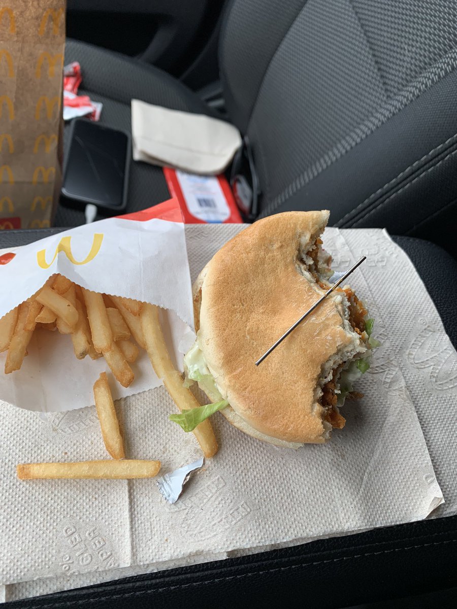 El_Bean_'s tweet photo. Hey @McDonalds do you guys want this piece of metal back? Just pulled this out of my spicy McChicken. Almost choked to death in my car https://t.co/maF12DaIqa