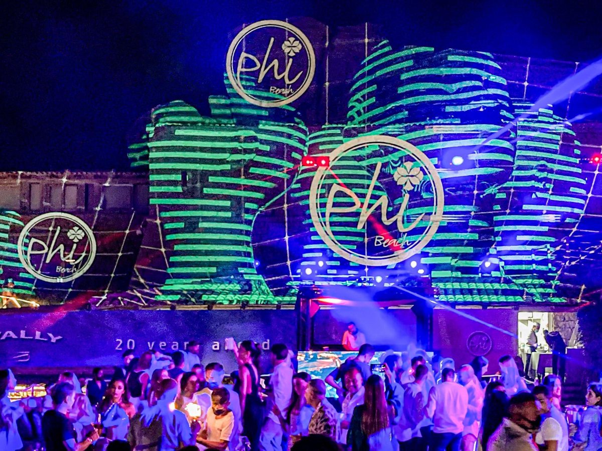 Robelighting's tweet photo. In Costa Smeralda, Sardinia, Italy, at the open air discotheque Phi Beach, LD Marco di Febo created a #lightingdesign using @Robelighting #MegaPointe, #Pointe, #LEDBeam150 & #LEDWash600 luminaires.
#robelighting #robeintherig #rmmultimedia #phibeach #nightclublighting https://t.co/Ei2e9Dn0YT