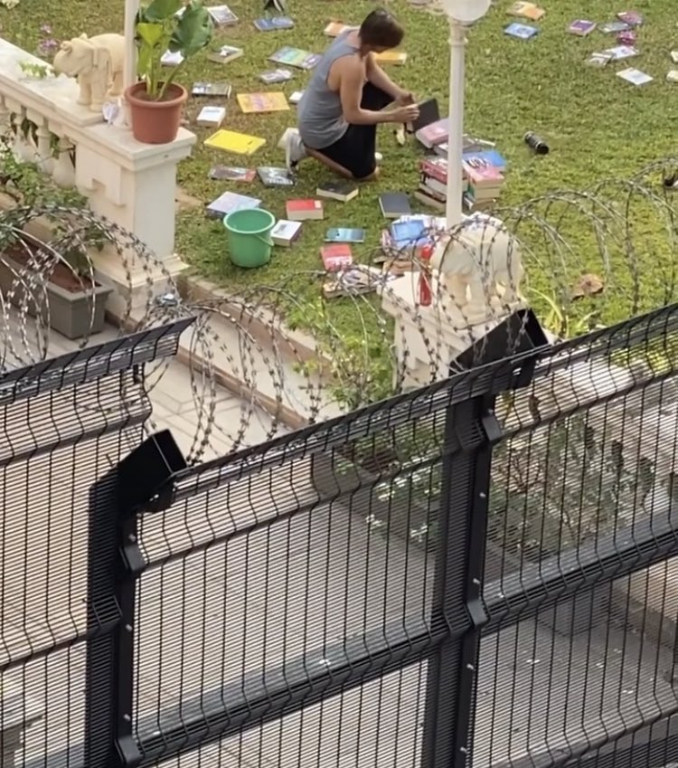 Shah rukh khan cleaning his books in his backyard. happy birthday srk  image courtesy of shireen gandhy 