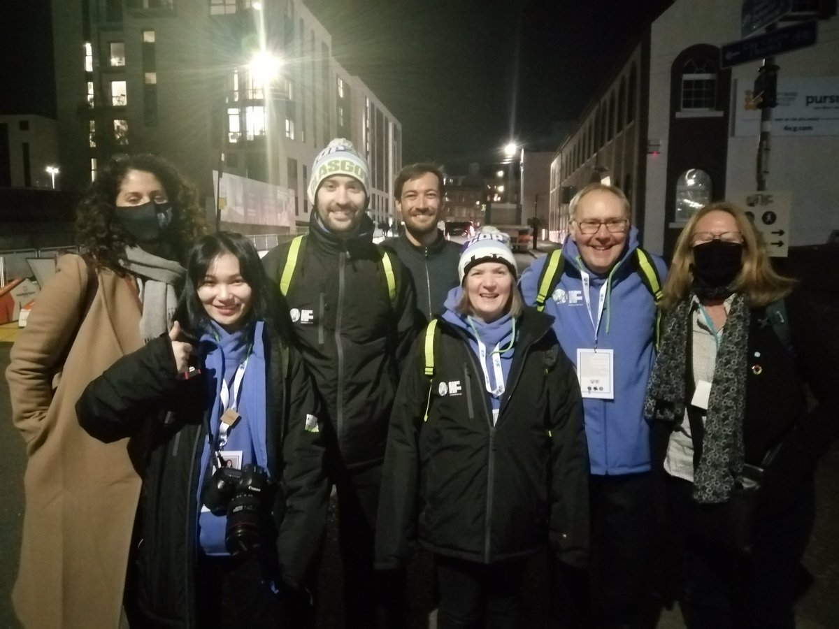 HebdenSophie's tweet photo. The @FutureEarth gang met the champion volunteers Mary Beveridge and others who have given up a fortnight to help and greet #COP26 visitors standing in the cold to help and be a friendly face #LocalHeroes Thank You! https://t.co/vYZfigMDfo