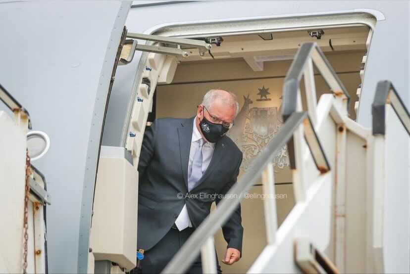 When you arrive back home after tarnishing Australia's reputation at a global climate summit, and need to check if the coast is clear: