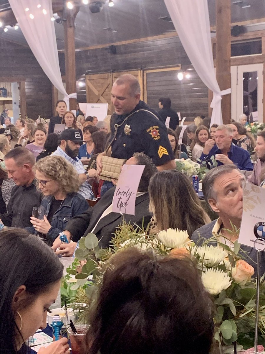 CSTXPolice's tweet photo. A few of our officers are having a bit of fun tonight modeling purses 👛 👮♂️ 👜 for BCS Together’s Purse Bingo — benefiting local foster children — thank you to all our neighbors who are supporting this great cause 👍 #BCSTogether #PurseBingo https://t.co/WyjRCehnNL