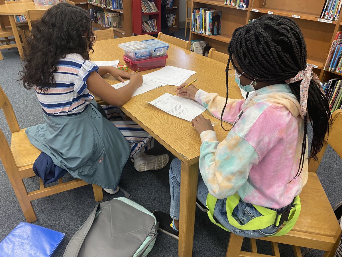 msbondknox's tweet photo. Did you know the library is so much more than books and a place to read?Here are a few intelligent young ladies who opted out of recess to visit the library and work on their math and read a good book. #KCSLMSknowvember #NoPlaceLikeBMA @BeaumontMagnet @BMAWindyC https://t.co/Bc2WQ3LF44