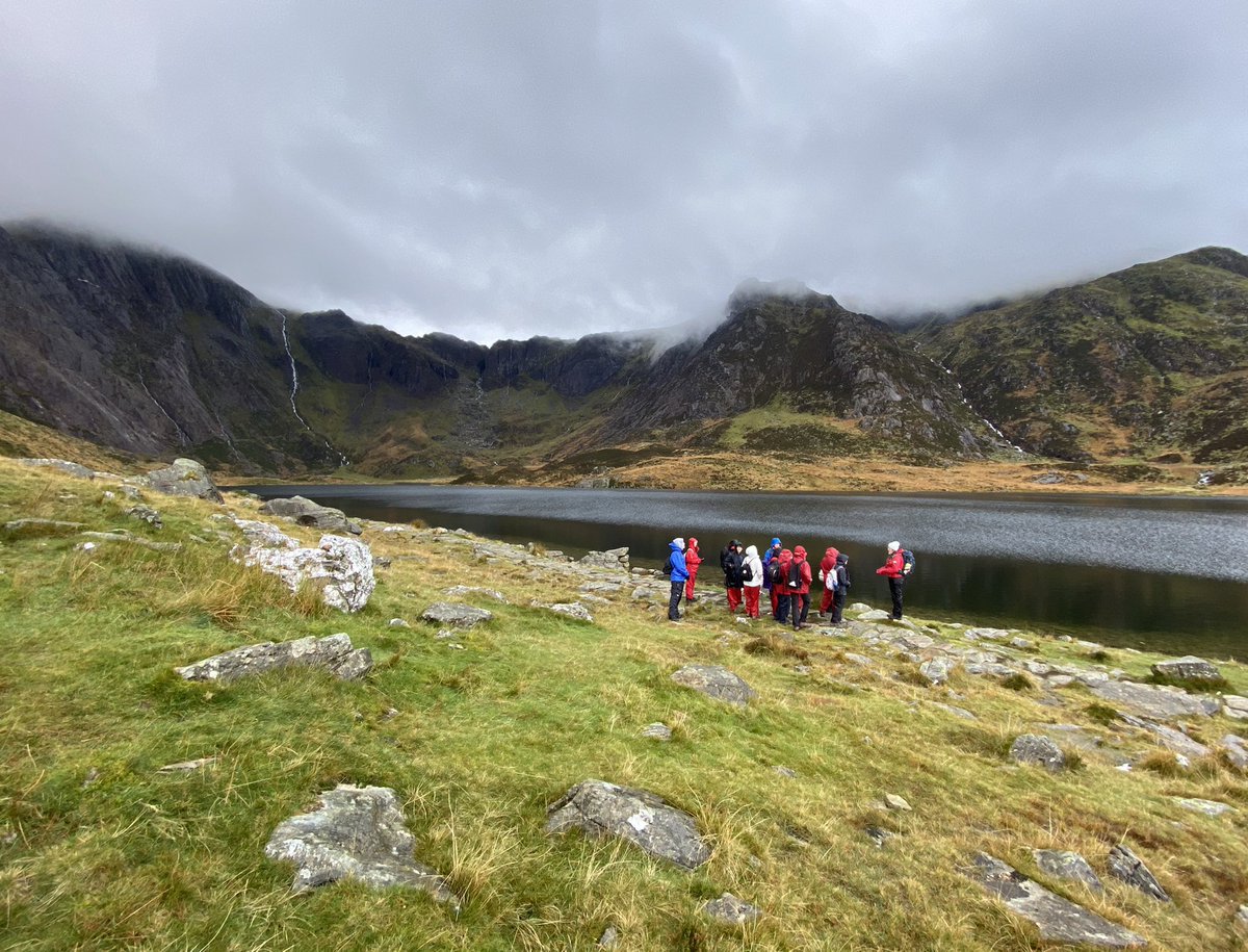 GeographyHchs's tweet photo. A Level Fieldwork Day 2! Today we walked up to Cwm Idwal to look at the spectacular post-glacial landscape. Students measured the orientation of the ice flow by looking at erratics, striations and roche moutonées!🧊 🧭 @HanleyCastle #snowdonia #fieldtrip #alevel #geography https://t.co/37eL0rnRSP