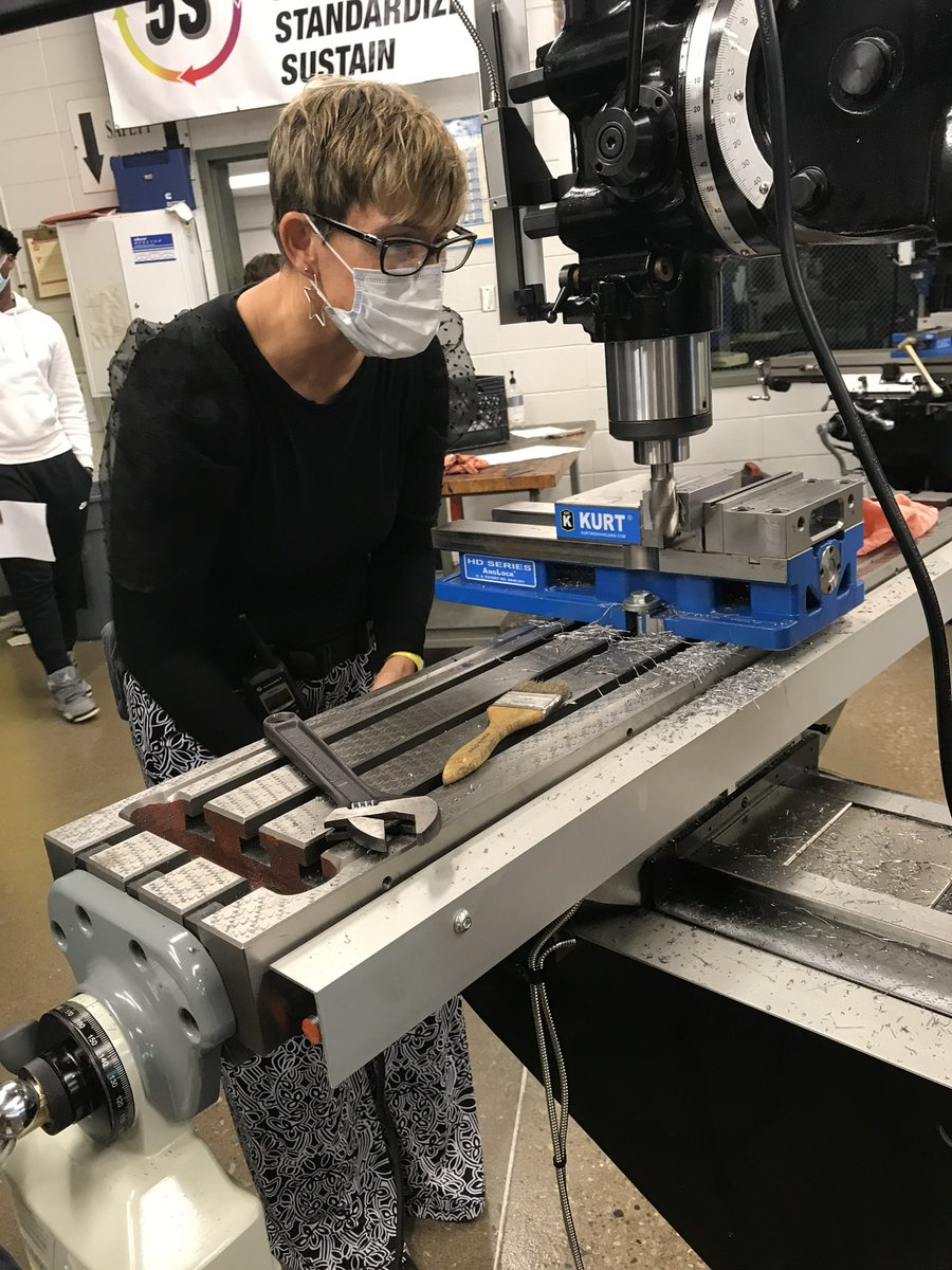 More work on the milling and lathe machines! Mrs. Lawrence actually got to help out a little! #METaLRules #leadlikeatrojan