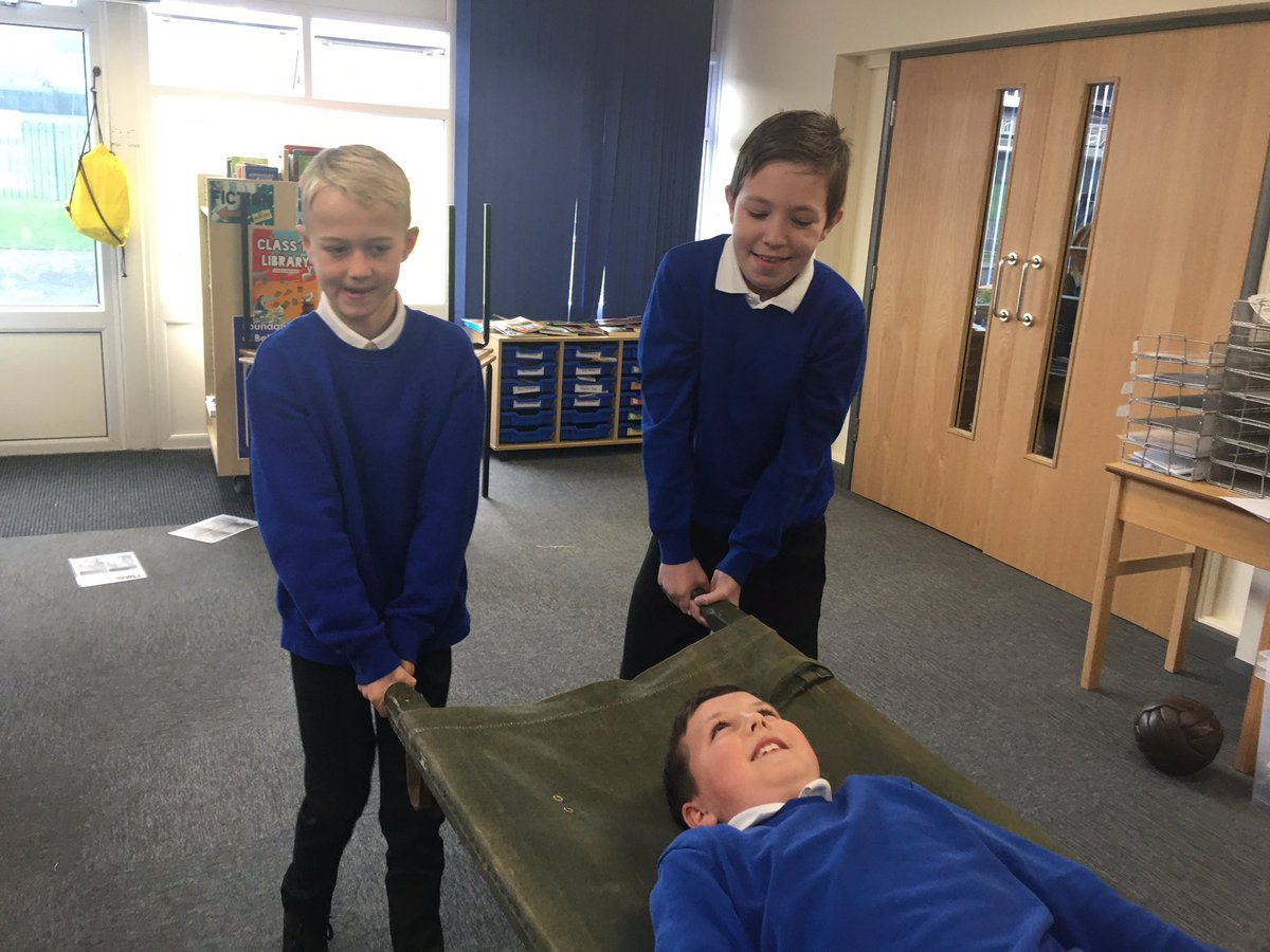 AcklamWhin's tweet image. Today in the WWI workshop, Class 13 have made soldier biscuits, learnt how to bandage and stretcher the wounded and hold a rifle, they’ve examined artefacts and undergone officer training. #fallenfields #lovelearning