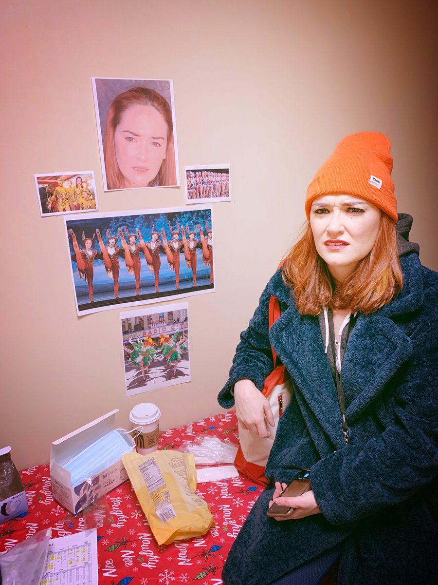 CteenDryer's tweet photo. Sent a picture to a group text thread with my cast at radio city of me being confused - which #iykyk at the Spectacular that is Christmas. They….REALLY understood the assignment. Peep the radio city logo on my Ted Lasso sweater. #adancerdances https://t.co/acHdtX2nMz