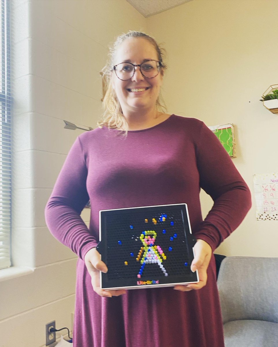 rebecca_resop's tweet photo. What other career allows you to play some 1:1 and get student made portraits of you in Lite Brites #ilovemyjob❤️ #studentscomefirst💙 #rapportfirst https://t.co/3k0GTQnBef