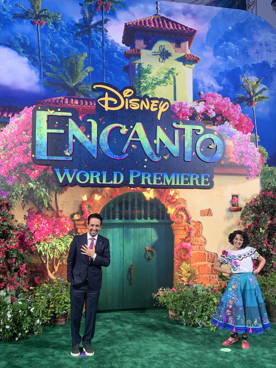 Lin_Manuel's tweet photo. When the Disneyland character you helped create is already at the world premiere of the movie... #Mirabel #EncantoDisney https://t.co/Il558gUgxP