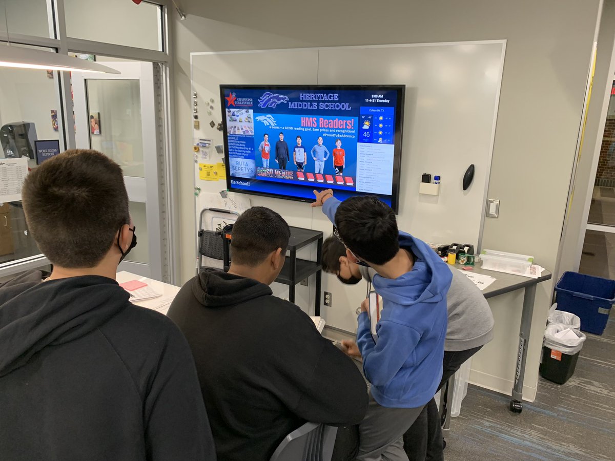 MrsQ_HMS's tweet photo. Check out these boy readers at HMS! #6Books #GCISDReads They waited for their friendโs picture to cycle through my scrolling announcements. โฅ๏ธ๐๐#gcisdlib https://t.co/bvBL4oEWwg