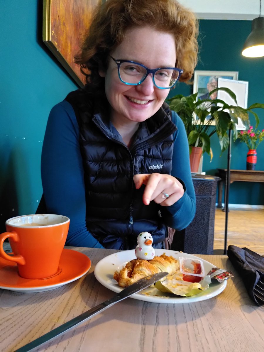 Kirstymill's tweet photo. #Archaeoduck has been out and about! He was delighted to meet up with @MayaHoole for coffee, but didn't quite grasp that croissants are for eating, not sitting on ..... https://t.co/SmVD8p0P8f