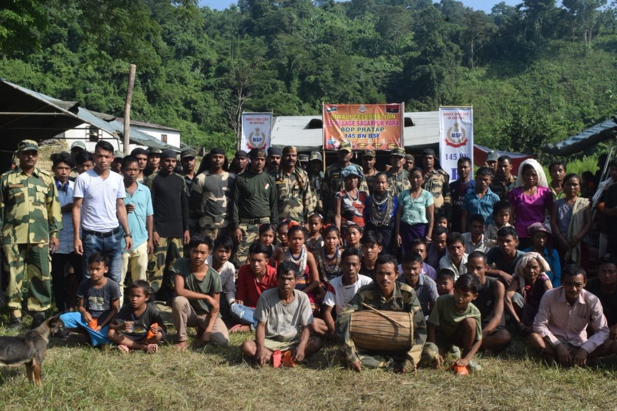 BSF_Tripura's tweet photo. Troopers of 145 Bn #BSF #Tripura shared the festivity &amp; joy of #Diwali #Celebrations with the villagers of the extreme border of #India-#Bangladesh i.e Sagarpara and Kolarampara, #Jampui Hill Ranges, District North Tripura.
#WeCare #HappyDeepavali
#FirstLineOfDefence
#NationFirst https://t.co/RzbZ3wRkud