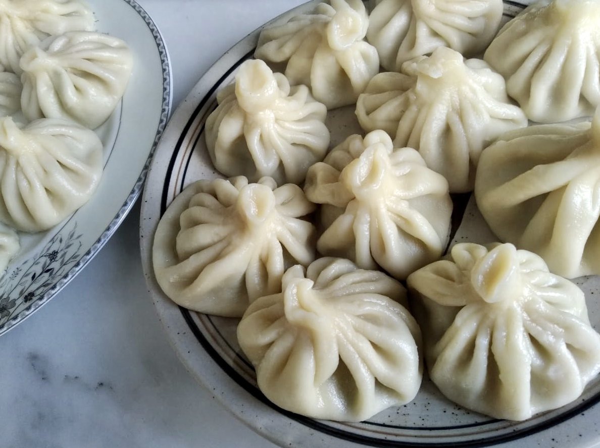 missetskaya's tweet photo. One of the famous Traditional Georgian dishes - Khinkali.
Large Georgian dumplings are filled with meat and spices and twisted into a knot at the top. 

Home made Georgian 🇬🇪 Khlinkali from our Korean 🇰🇷 Grandma. 
So delicious!

You should definitely try it during #WCDC2022
#iACD https://t.co/gIMOeXMDJT