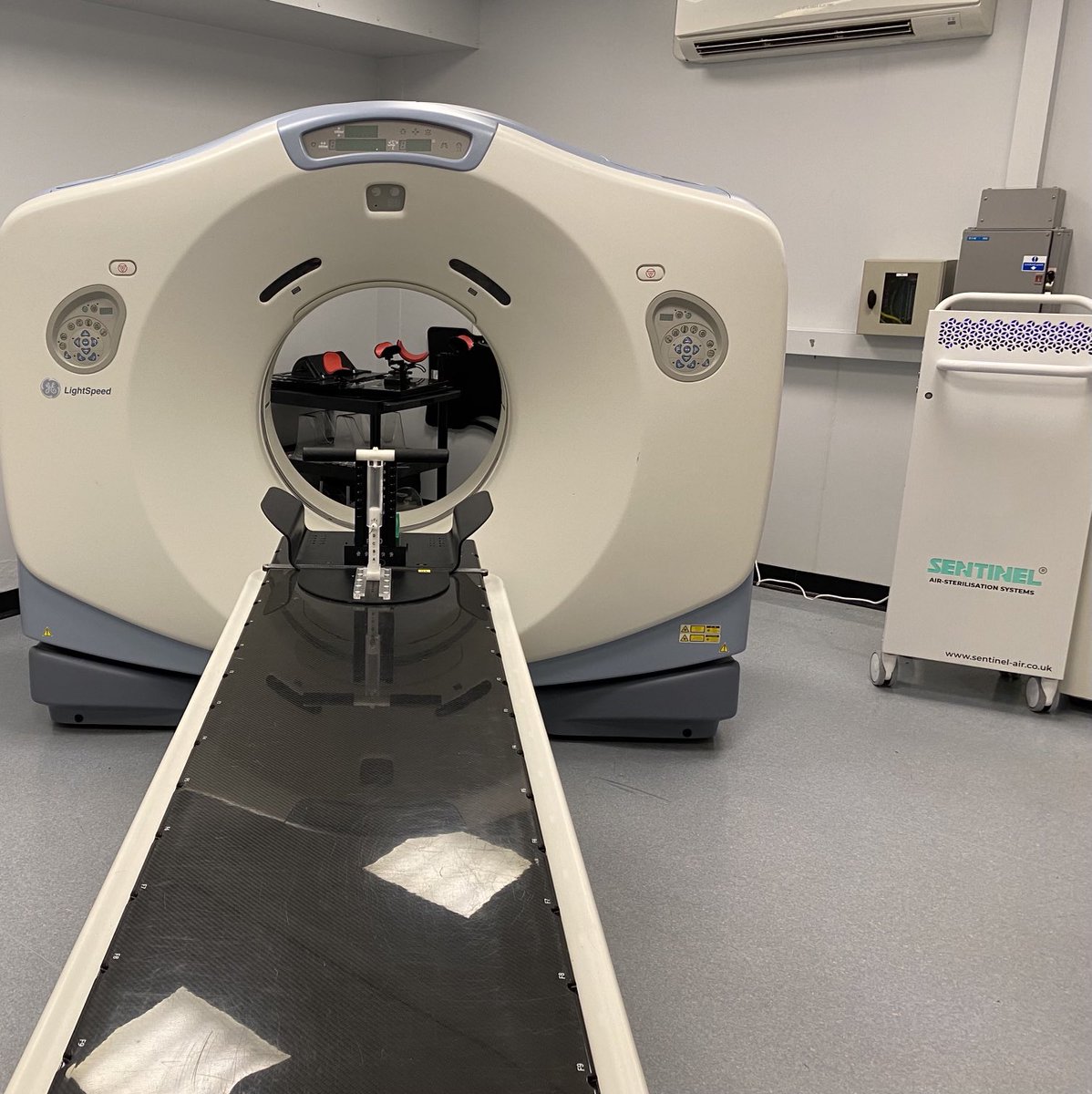 mackay_s's tweet photo. Another Quick game but slightly easier - spot the Sentinel AirSteriliser purifying the air so we can keep students safe whilst undertake practicals in the CT scan room at University of Liverpool ⁦@SCoRMembers⁩ ⁦@LivUniDiagRad⁩ https://t.co/rDXHov8vRj