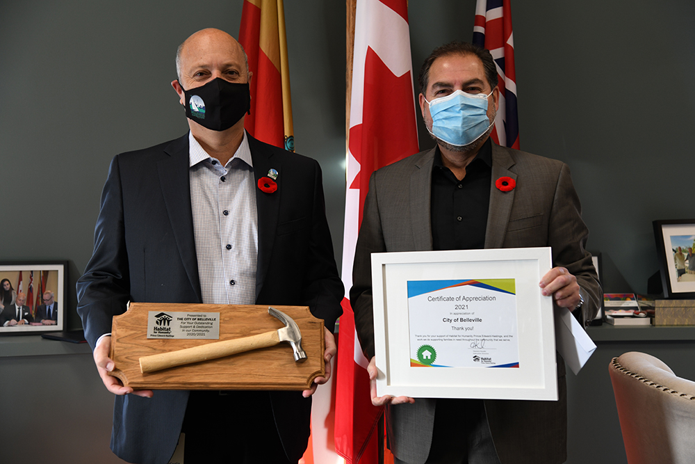 Community l Mayor Panciuk was presented a plaque and certificate of appreciation by Hazzem (Hank) Koudsi, Executive Director of Habitat for Humanity Prince Edward-Hastings, for the City's support of their organization and of the work they do within our community.