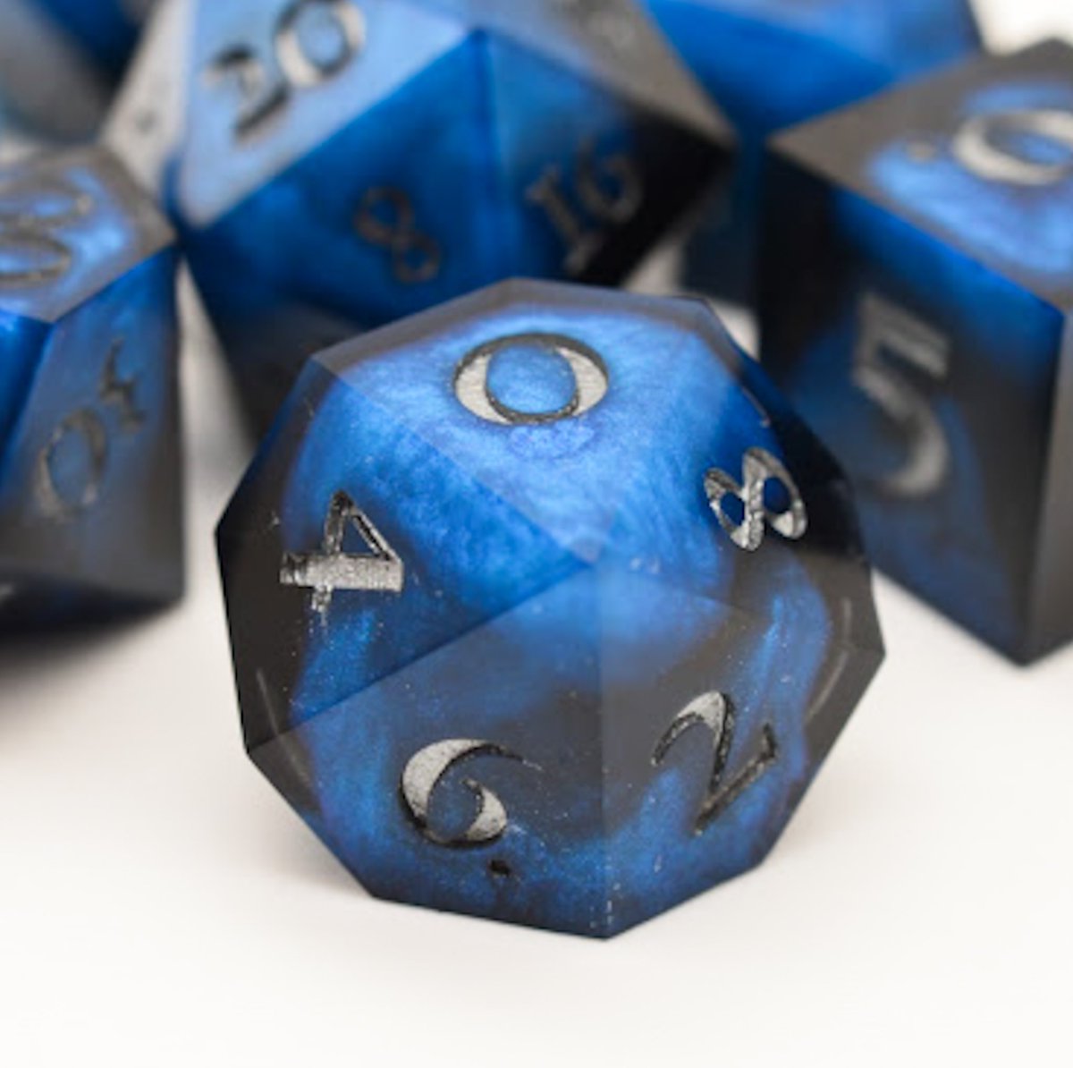 sevenfatesdice's tweet image. Black Ice. Inked. 

Vibrant blues peak through a black base in these dice. 

Thank you all for your incredible name suggestions. 

#dice #rpgdice #DnD #ttrpg #d20
