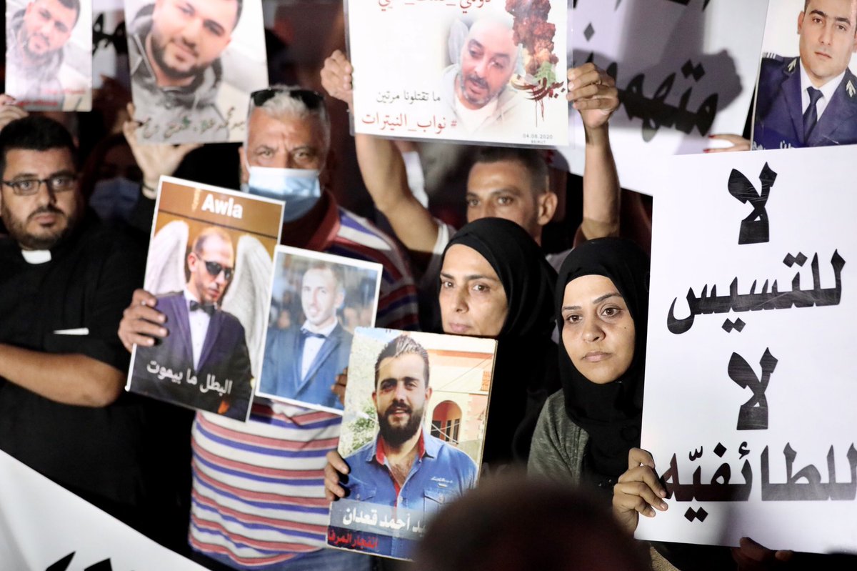 MatthieuKaram's tweet photo. Families of the #BeirutExplosion victims gathered in front of the port, 15 months after the deadly blast. Another group of relatives, opposed to this one, gathered a few hundred meters from here. #lebanon #beirut https://t.co/AP3UhHnNub