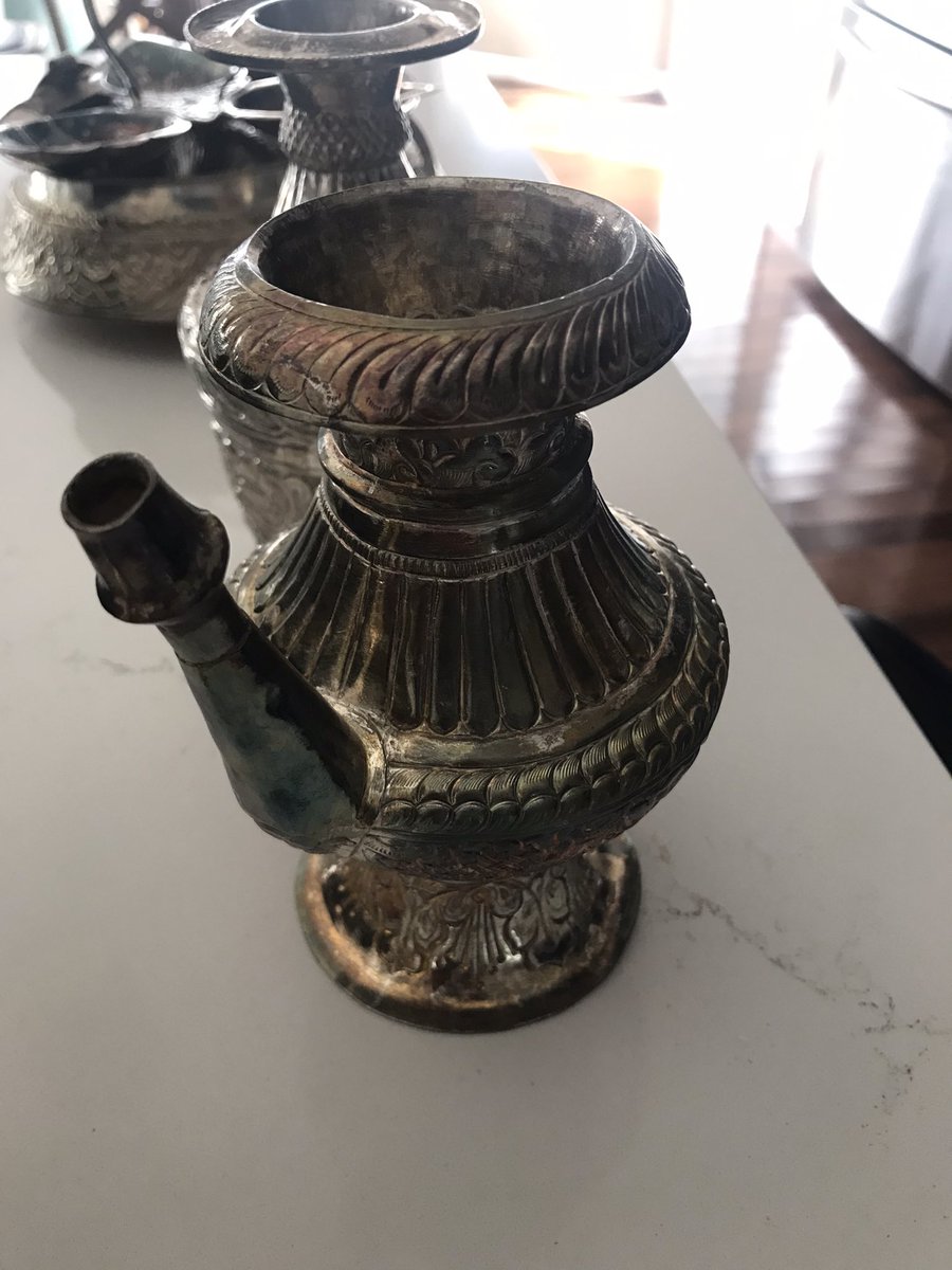 Stewie0424's tweet photo. I know most of us use silver dishes during these festivals. If your silver dishes are tarnished, use baking soda, aluminum foil and hot water mixture to clean the tarnish/rust and give it that shine. Before and after pics. Make sure you wear a mask before you immerse them though. https://t.co/N4qJ7RYVSc