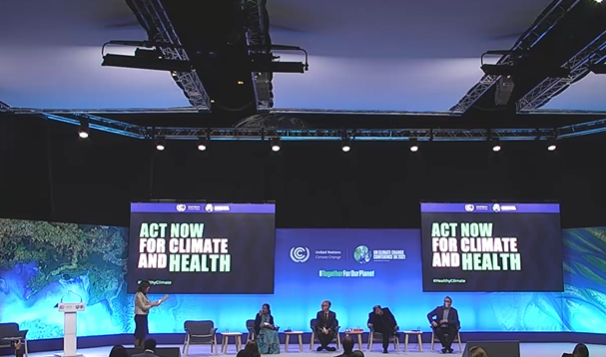 alexiskeech's tweet photo. @nickwatts talking about the @GreenerNHS programme at #COP26 on the #HealthPavillion in a #ShowYourStripes #ReusableFacemask! https://t.co/7Vc7folLgz