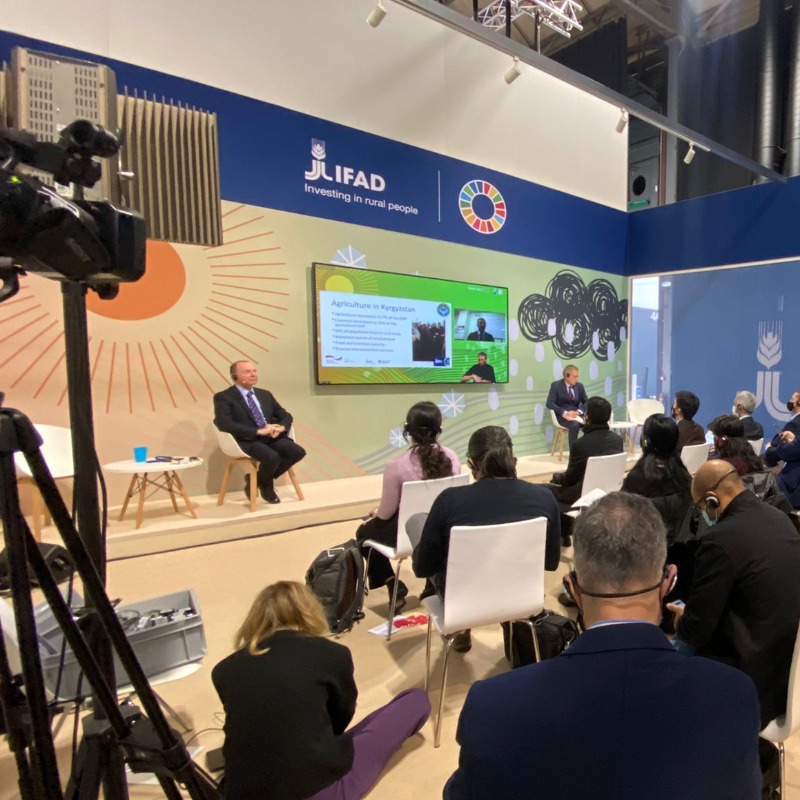 IFAD's tweet photo. This is what it looks like to be at #COP26 👋 If you are not attending in person, we're still waiting for you online. Check out our Pavilion events and join us!