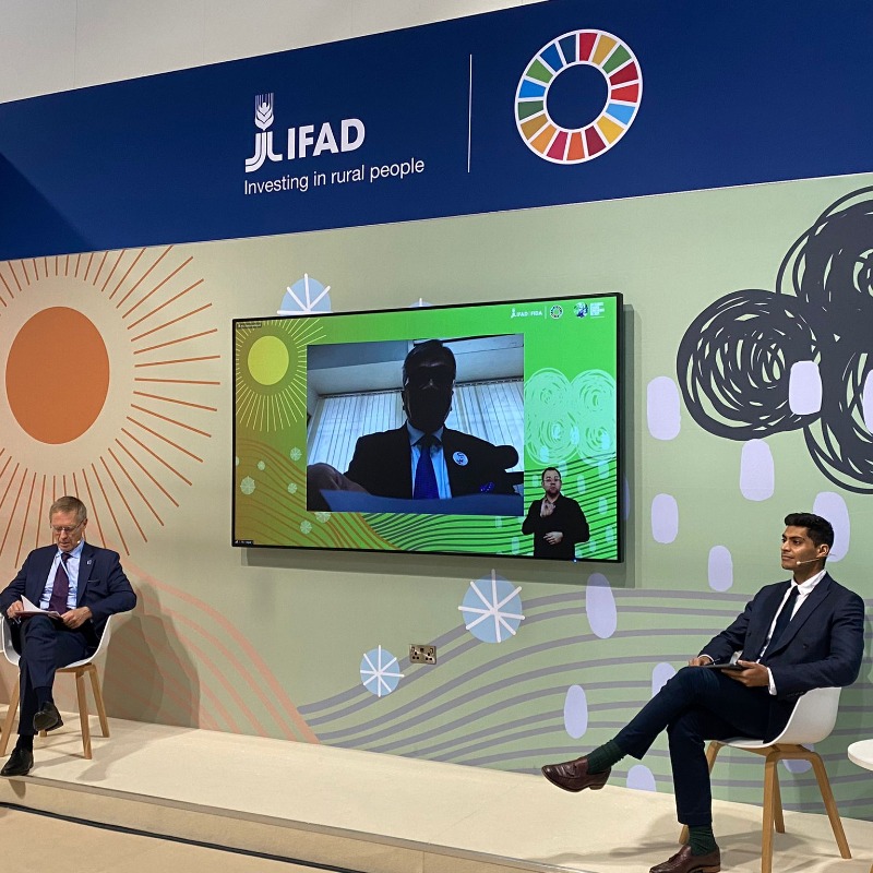 IFAD's tweet photo. This is what it looks like to be at #COP26 👋 If you are not attending in person, we're still waiting for you online. Check out our Pavilion events and join us!