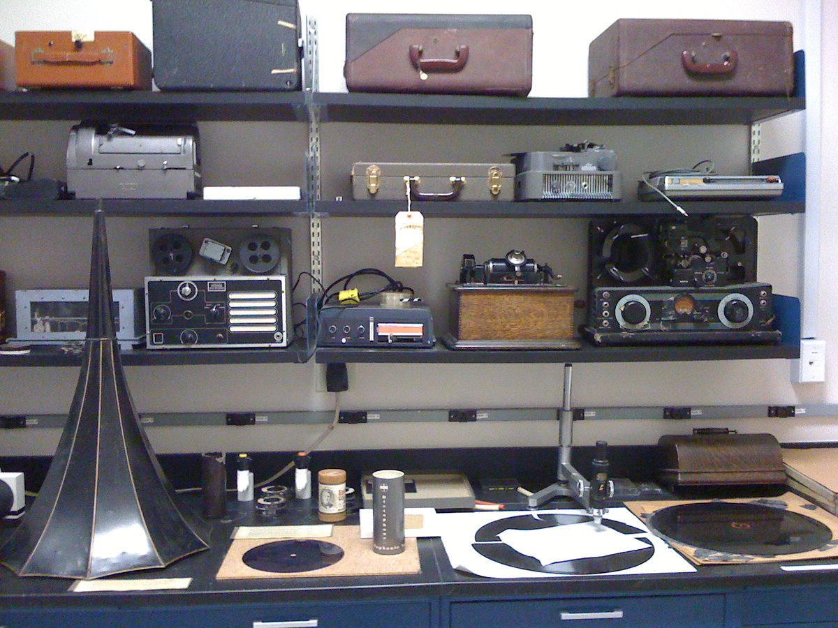 USNatArchives's tweet photo. Here's our museum wall! Can you tell we like ‘old stuff’?
And don't worry these are just examples- the real records are stored in carefully controlled conditions in the stacks.
#avpreservation #waxcylinder #wirerecording #audographdisc #AskAConservator https://t.co/DqMZsmMgqO