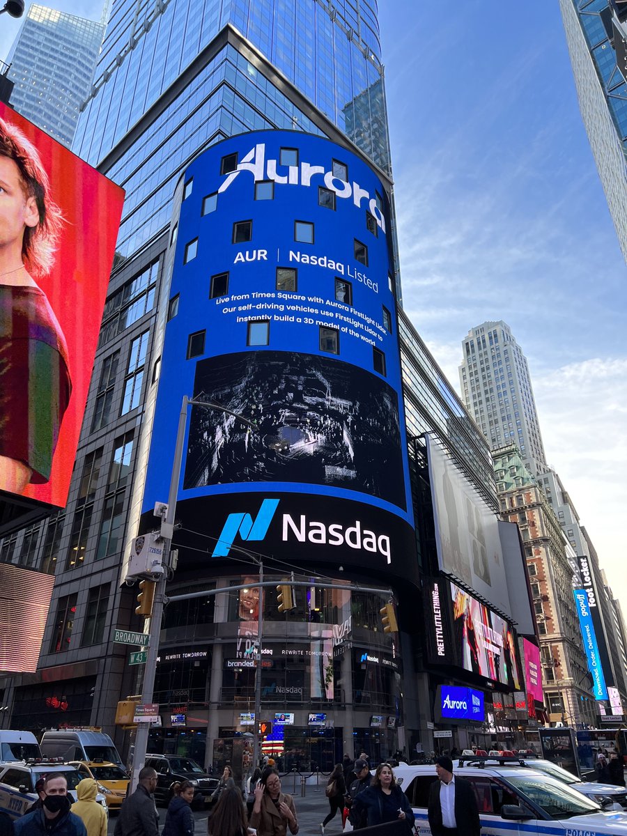 mavolpi's tweet photo. ‘@aurora_inno celebrates its public listing! @chris_urmson has come a long way from rumbling around in his mom’s V12 Gran Torino to becoming the leader in self-driving technology. A tremendous project to be part of. (photo:  LIDAR image of Times Square on NASDAQ Marketplace bldg) https://t.co/JQYEgAX2BQ