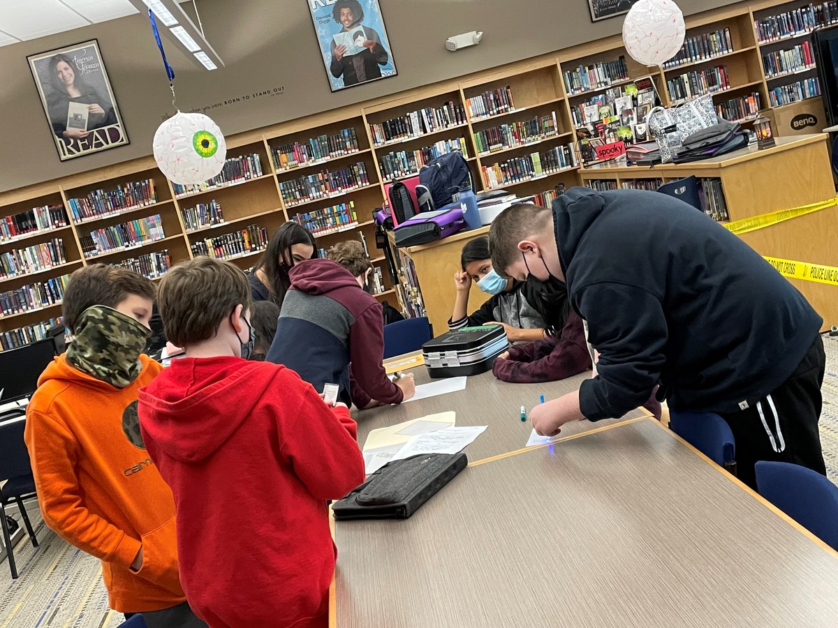 RMS students crack the case of the Tell Tale Heart escape room!