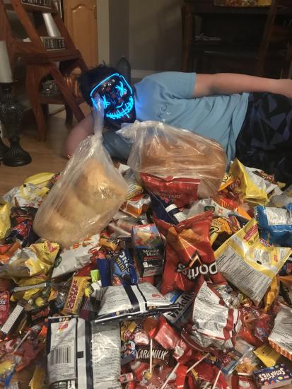 downhomelife's tweet photo. B'ys, we got these photos on our website of the most NL Halloween treats these two kids got this year. Can anyone top salt fish and homemade bread? #onlyinNL #BetterThanCandyCorn #AllThatAndBagsOfChips https://t.co/w1BT2HXkgZ