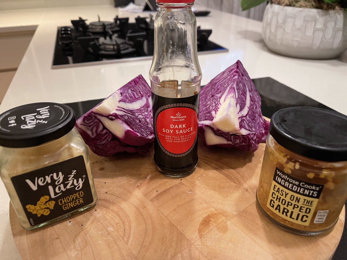 I bought a red cabbage and wasn’t sure how to cook it! So I just busked it!
Red Cabbage is seasonal and in store til December. Cut cabbage into 4 remove core and shred 2 of the quarters  boil for 5 mins, sieve then back in pan add soy sauce garlic and ginger a delicious accident!