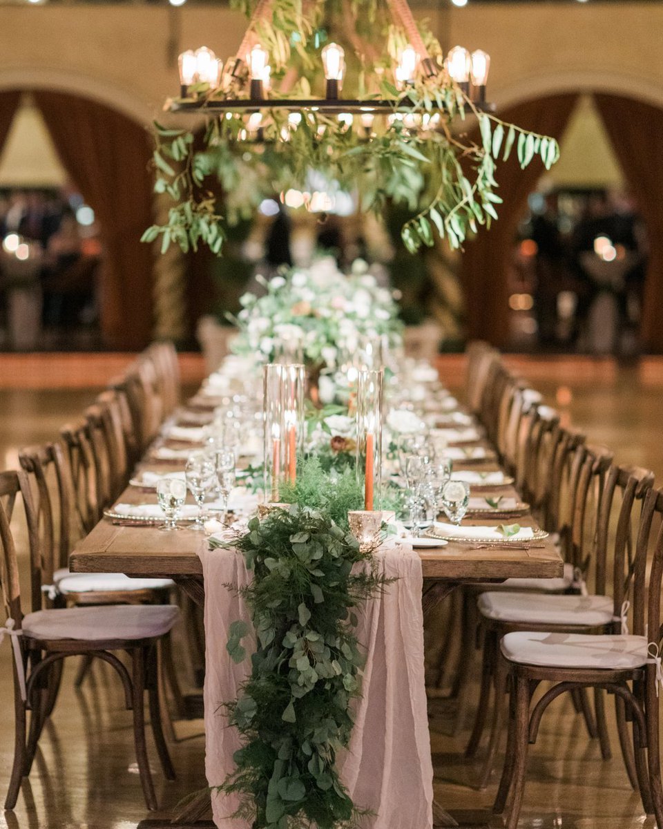 This is one of the prettiest receptions we've had the pleasure of creating! A rustic elegant design at the historic @indianaroofballroom 🌿 Originally, Kelleen and Kevin wanted to have their reception in a barn, but opted not to with the intense summer humidity here in Indiana.