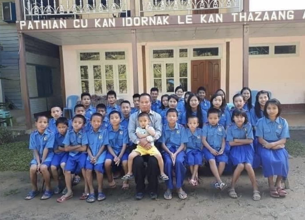 uscb's tweet photo. When the #Burma military burned #Thantlang to the ground, more than 20 children and their teachers were trapped in an orphanage. CDF-Thantlang reported that they saved the children from the orphanage.
#Myanmar #WhatsHappeningInMyanmar 
PC: Chindwin News https://t.co/ZcqBFlSTYY