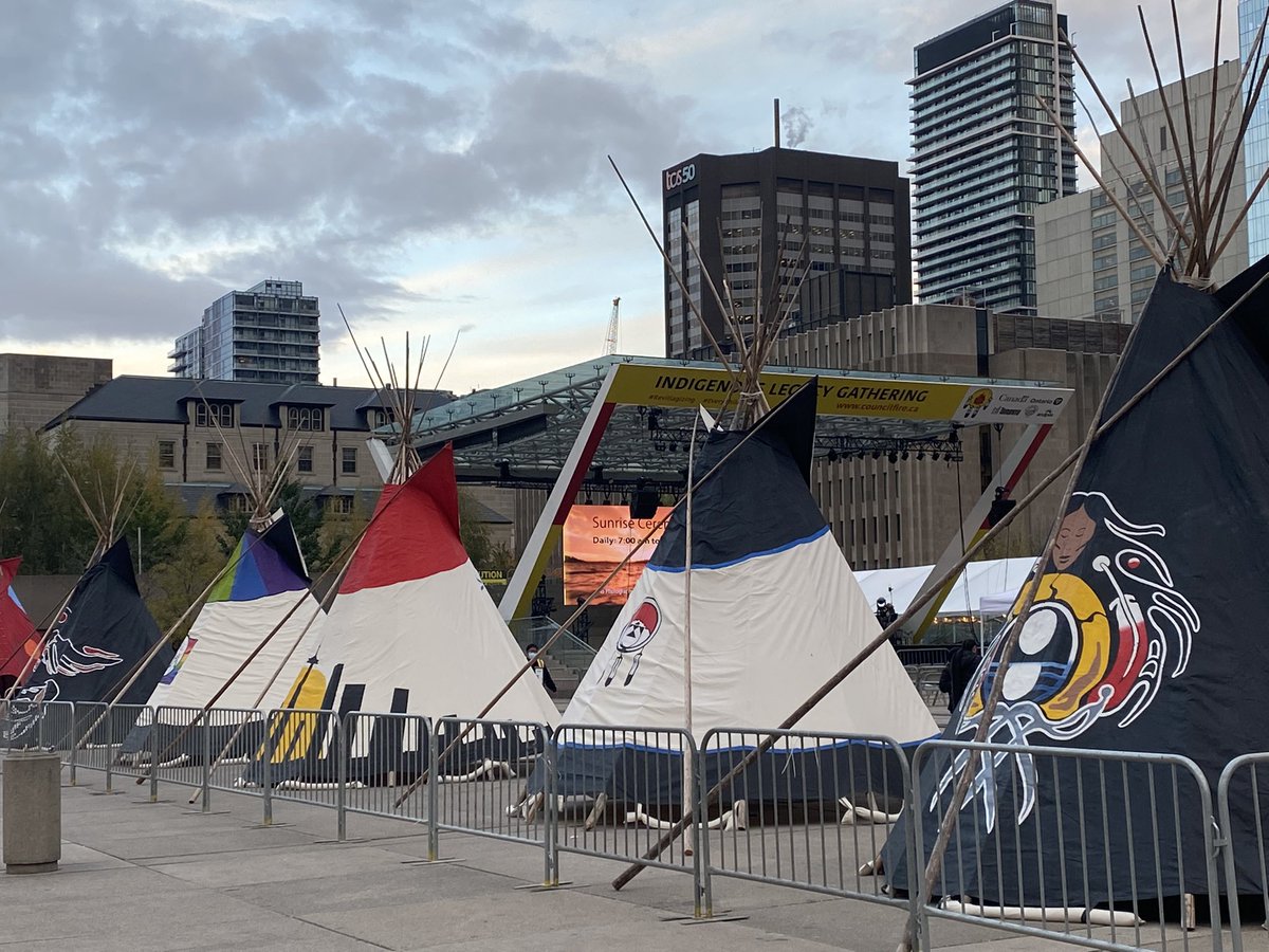 UIEC_Tdsb's tweet photo. Indigenous Legacy Gathering @ Nathan Philips Square. Grandma Pauline Shirt started in a good way with a sunrise ceremony and @UIEC_Tdsb &amp; @KWSS_TDSB representing with tipi and swag! Lots of great vendors, food, dancers and musicians. https://t.co/vbzL0jv17J