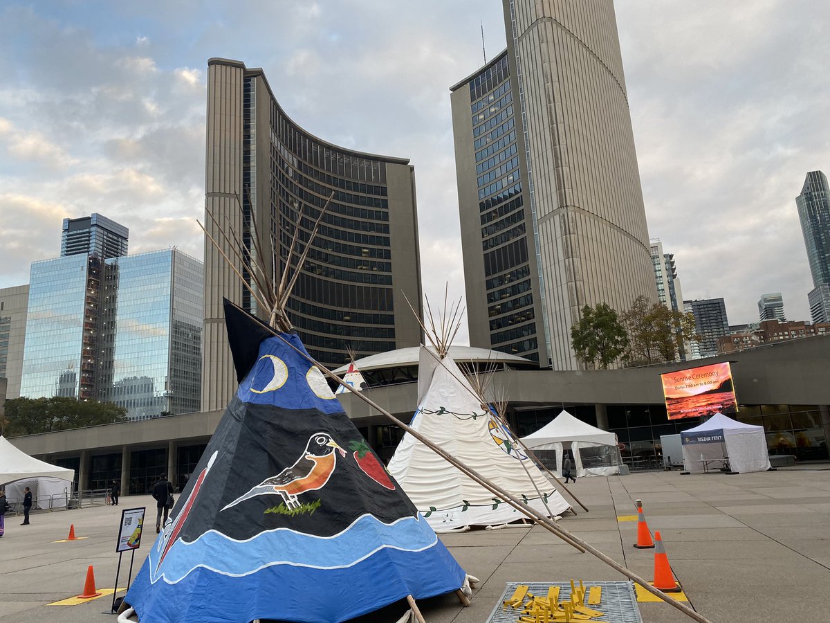 UIEC_Tdsb's tweet photo. Indigenous Legacy Gathering @ Nathan Philips Square. Grandma Pauline Shirt started in a good way with a sunrise ceremony and @UIEC_Tdsb &amp; @KWSS_TDSB representing with tipi and swag! Lots of great vendors, food, dancers and musicians. https://t.co/vbzL0jv17J