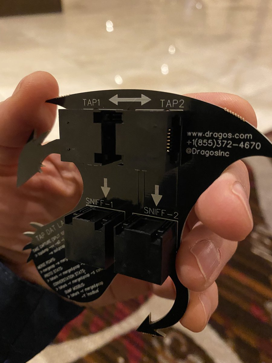 CyberMurphy's tweet photo. Pretty cool (and useful) swag at @DragosInc #DISC2021 conference.  A low tech network tap.  I am going to try this puppy out in the hotel tonight!! https://t.co/941tYo5Fep