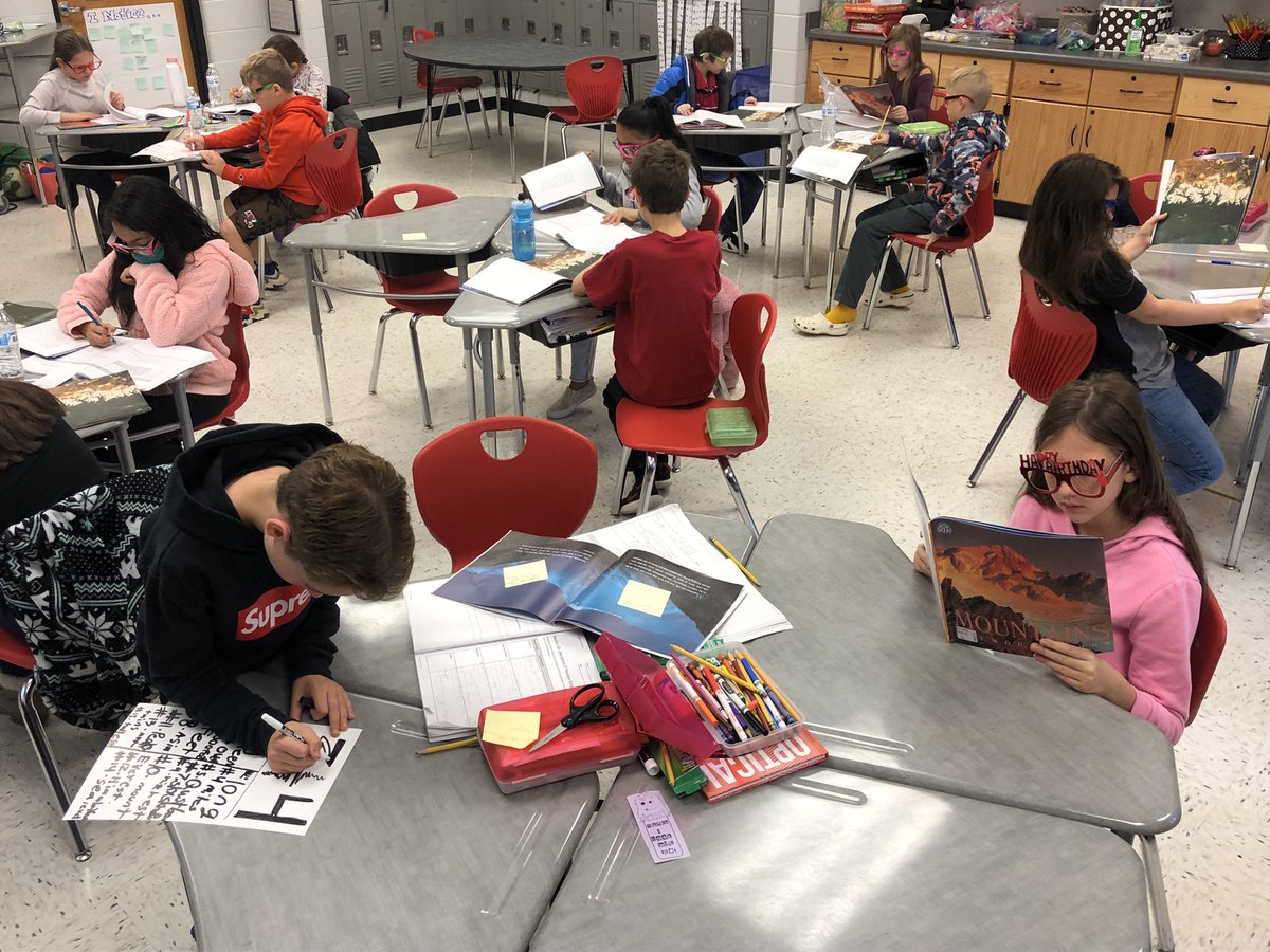 Students got a kick out of putting on their  “writing glasses” to investigate the writing techniques of Mr. Seymour Simon! Fun with fourth!