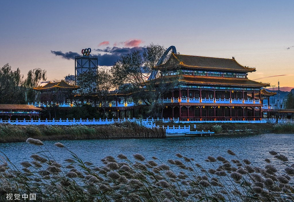 PDChinaSports's tweet photo. In pics: Winter Olympic Park silhouetted against setting sun in Beijing. https://t.co/TCTzplUMY3