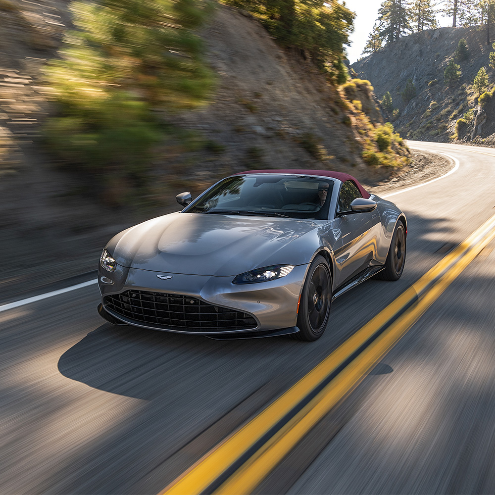 astonmartin's tweet photo. What better way to experience Vantage's roaring V8 than with the top down? 

#AstonMartin #VantageRoadster https://t.co/2g4QMcoXlZ