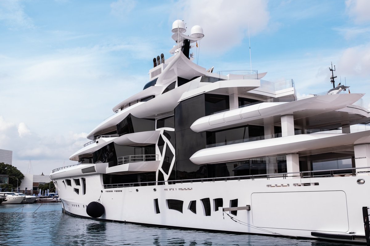 MarinaPortVell's tweet photo. The brand new and splendid MY Artefact at #MarinaPortVellBarcelona. Described as the smartest #superyacht afloat, this 80m marvel stands out for her magnificent, near-invisible glass walls and her innovative emission control system. We can't stop admiring her! #Sustainability https://t.co/wCLArqOXyV