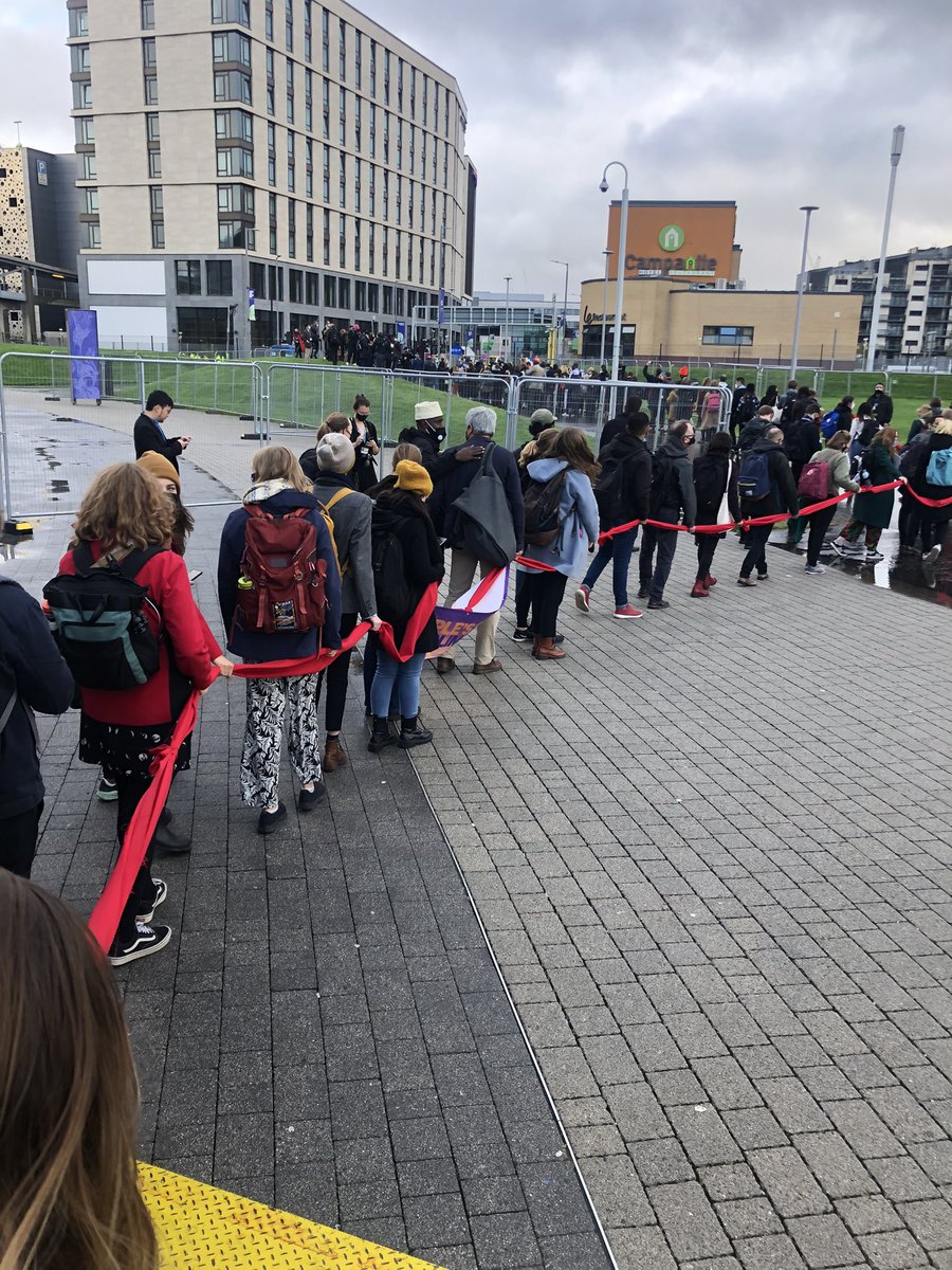 OliHenman's tweet photo. March of #solidarity after #PeoplesPlenary through #COP26 ‘What do we want?’ #ClimateJusticeNow #FacesFromTheFrontlines https://t.co/IfybRkSzyc