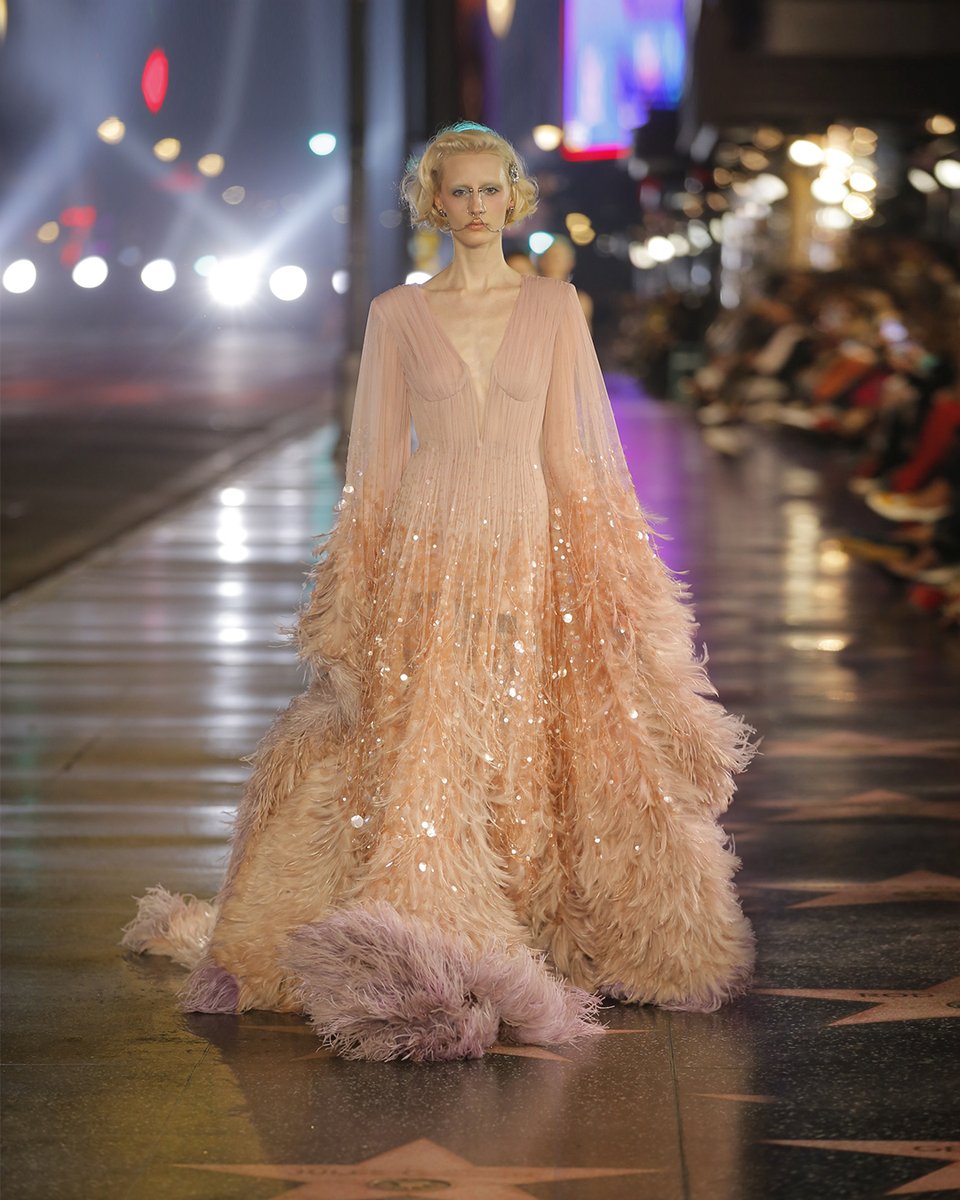 gucci's tweet photo. The evening gowns of #GucciLoveParade recall those worn by the Hollywood stars of yesterday and are transported to the present through maxi proportions, brilliant colors and spectacular details. #AlessandroMichele https://t.co/M00VvcUY0h