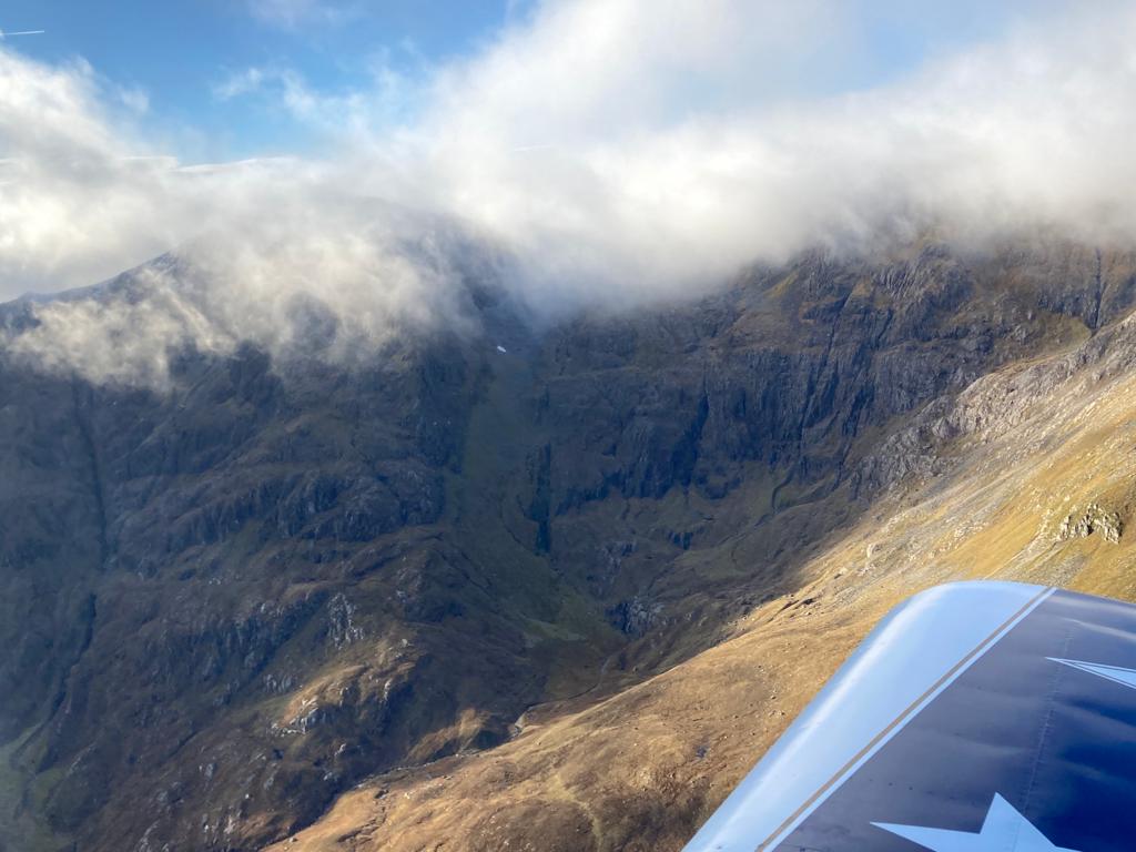 theiaincameron's tweet photo. Scotland's sole-surviving patch from last winter was seen yesterday by Douglas Cairns as he took his light aircraft for a service. The snow visible here fell in late 2019 and is in the region of 20 metres long. 

Turbulence precluded a closer look at the patch. https://t.co/XoiNIO2Lmb