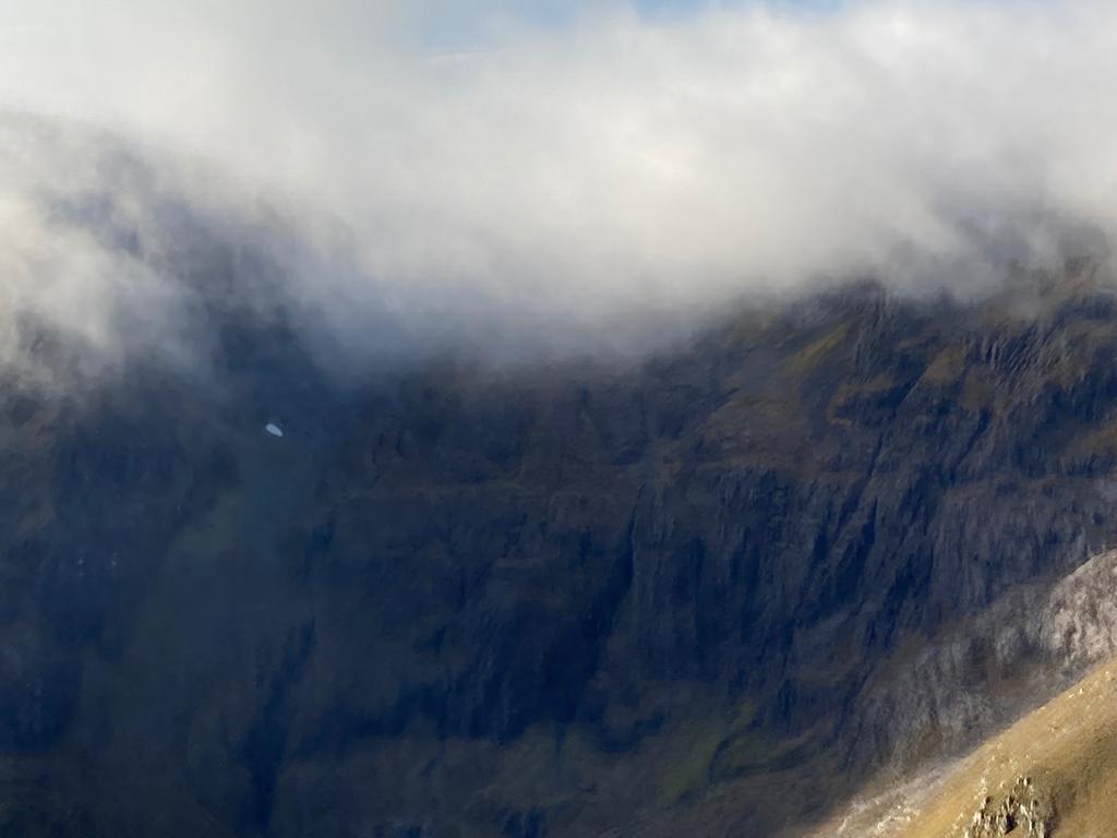 theiaincameron's tweet photo. Scotland's sole-surviving patch from last winter was seen yesterday by Douglas Cairns as he took his light aircraft for a service. The snow visible here fell in late 2019 and is in the region of 20 metres long. 

Turbulence precluded a closer look at the patch. https://t.co/XoiNIO2Lmb
