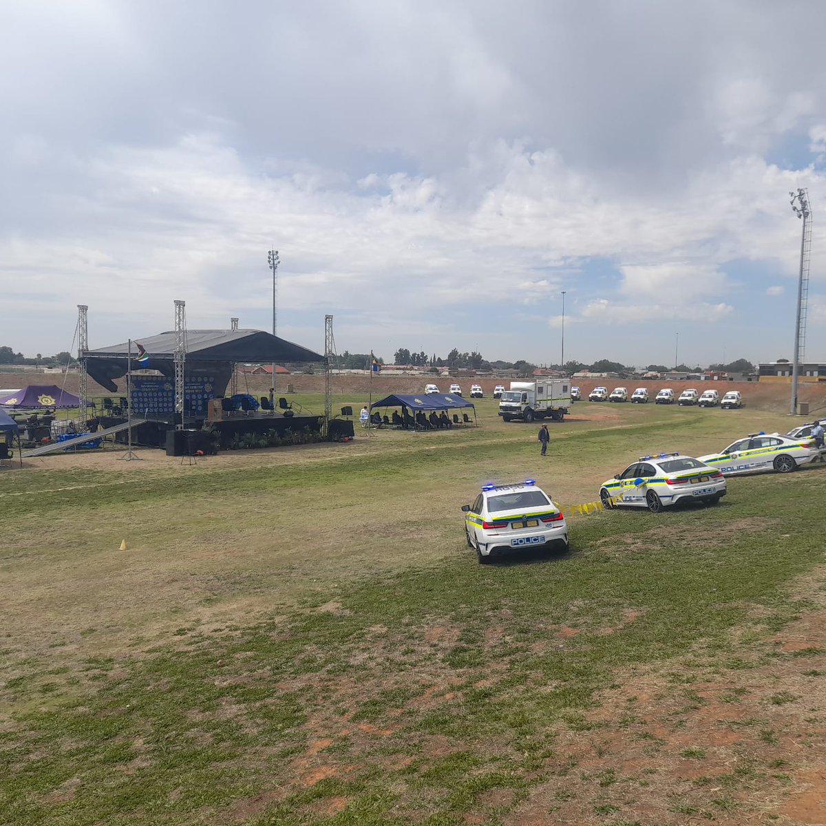 SAPoliceService's tweet photo. #sapsFS The Provincial Launch for the #SaferFestiveSeason operatons are underway at Vuyo Charles Stadium in Thabong, Welkom. Motorcade at Mannis in Welkom waiting for the arrival of #SAPSNPC, Gen Sitole and entourage. #PoliceVisibility #PartnershipPolicing #CountryInBlue ME https://t.co/xVyUWO8AcN