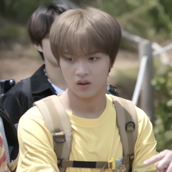 haechan looks adorable in his yellow sweater