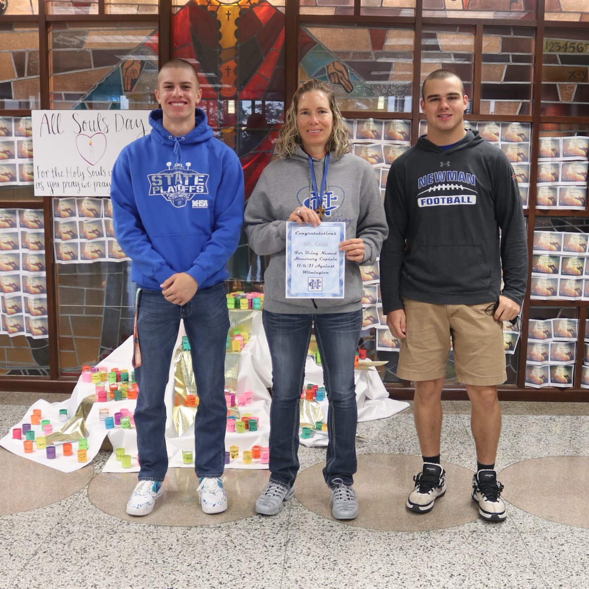 NewmanCCHS's tweet photo. Congratulations, Ms. Cook! @NewmanFootball1 Honorary Captain of the Week! #gocomets #rollonbluemachine #newmanstrong https://t.co/NguhElc8hC https://t.co/i36dF9mhxP