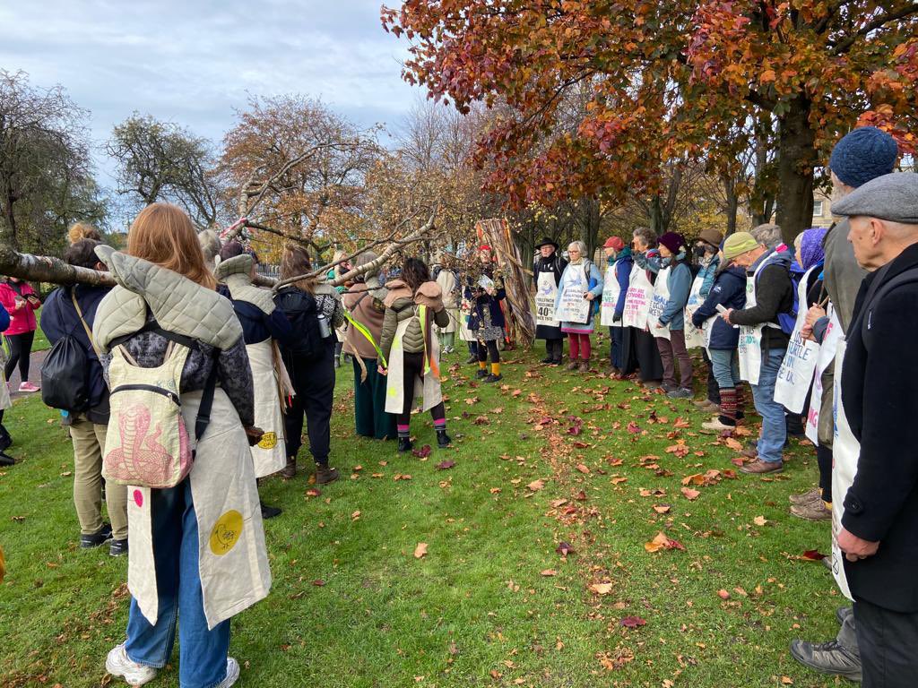 WalkingForest4's tweet photo. We’re just leaving Glasgow Green after a moving encounter with XR Extinct Birds.  

We touched our grief and found our courage with @StopEcocide and are now moving along the river.

Walk With Us. #WalkingForest #COP26 https://t.co/0VAuiSq3Ry