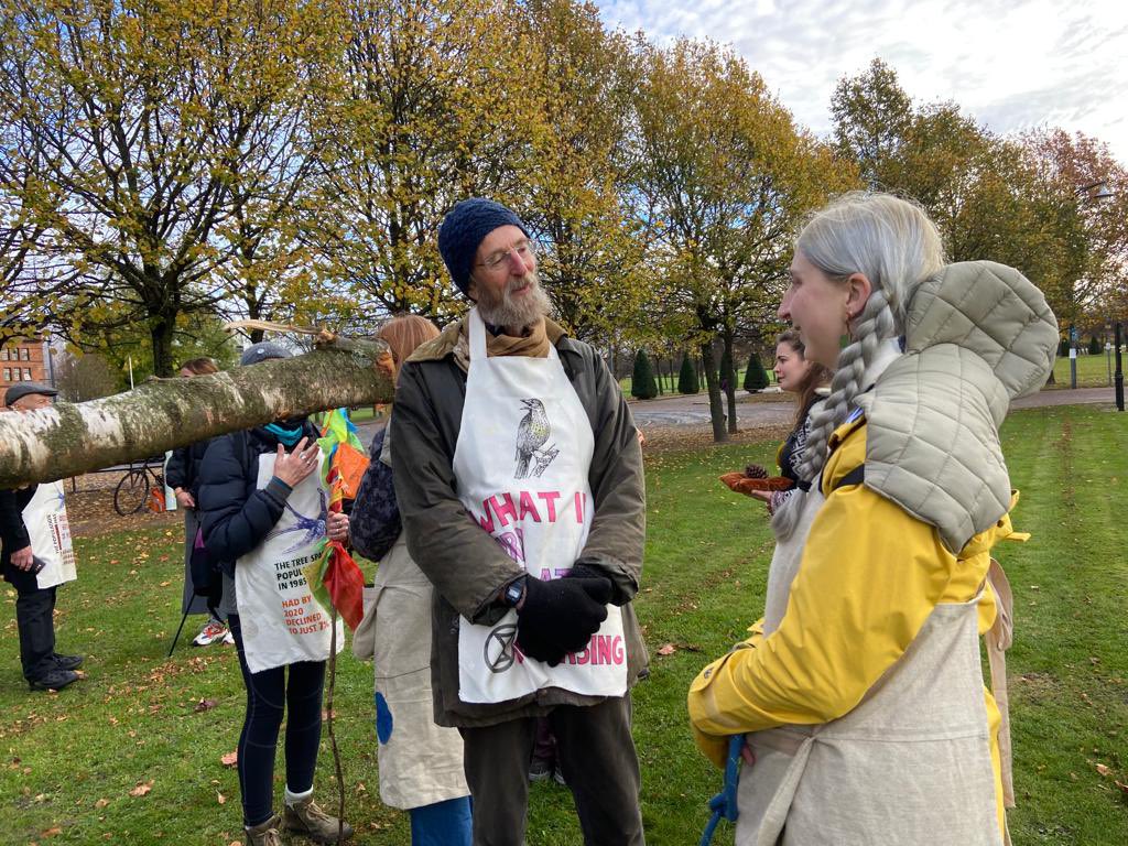 WalkingForest4's tweet photo. We’re just leaving Glasgow Green after a moving encounter with XR Extinct Birds.  

We touched our grief and found our courage with @StopEcocide and are now moving along the river.

Walk With Us. #WalkingForest #COP26 https://t.co/0VAuiSq3Ry