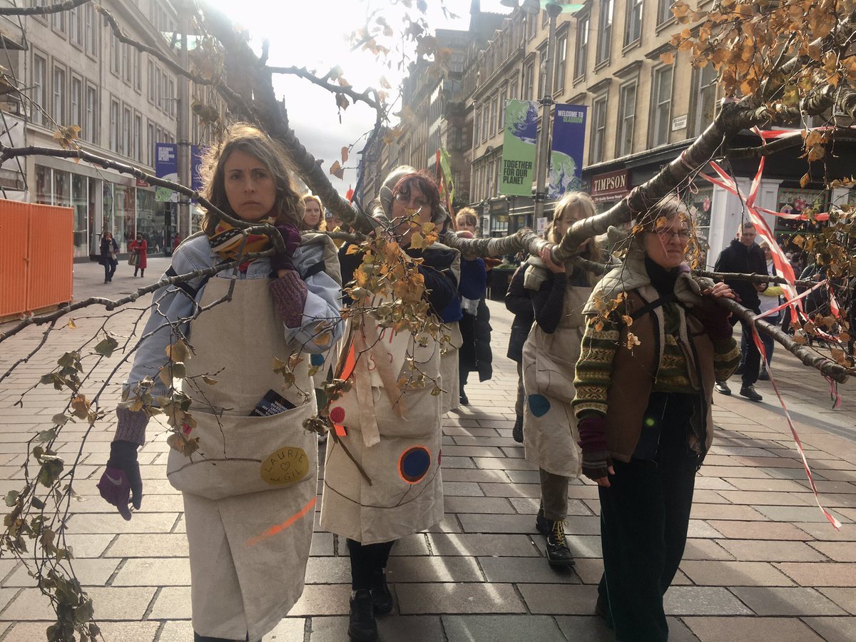 WalkingForest4's tweet photo. We are now walking from St Enoch Sq to George Sq..

We are #WalkingForest 
We carry a felled tree.
And seeds of courage.
We declare ourselves welcome here. 

Walk with us and join our live stream event at 2pm: https://t.co/PnfwpKItJT @After_Pandemic @Coventry2021 https://t.co/SfIhs6iK2R